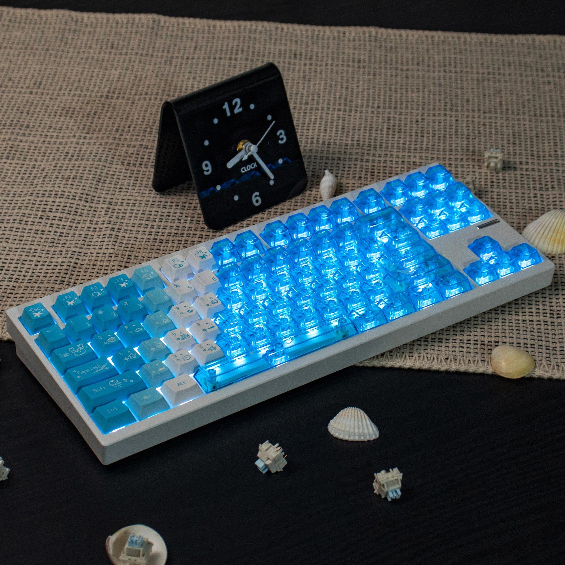 Full view of custom Cherry profile Deep Sea Blue keyboard with premium blue backlight by Taptempo, high-value desk setup shipping to US and EU.